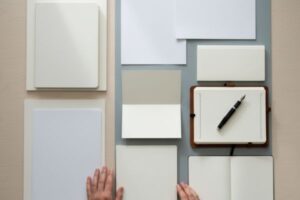 A clean desk viewed from above with multiple documents