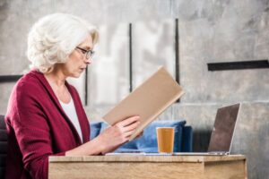 senior women reviewing a document 