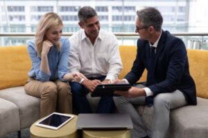 married couple meeting with estate planning attoryney