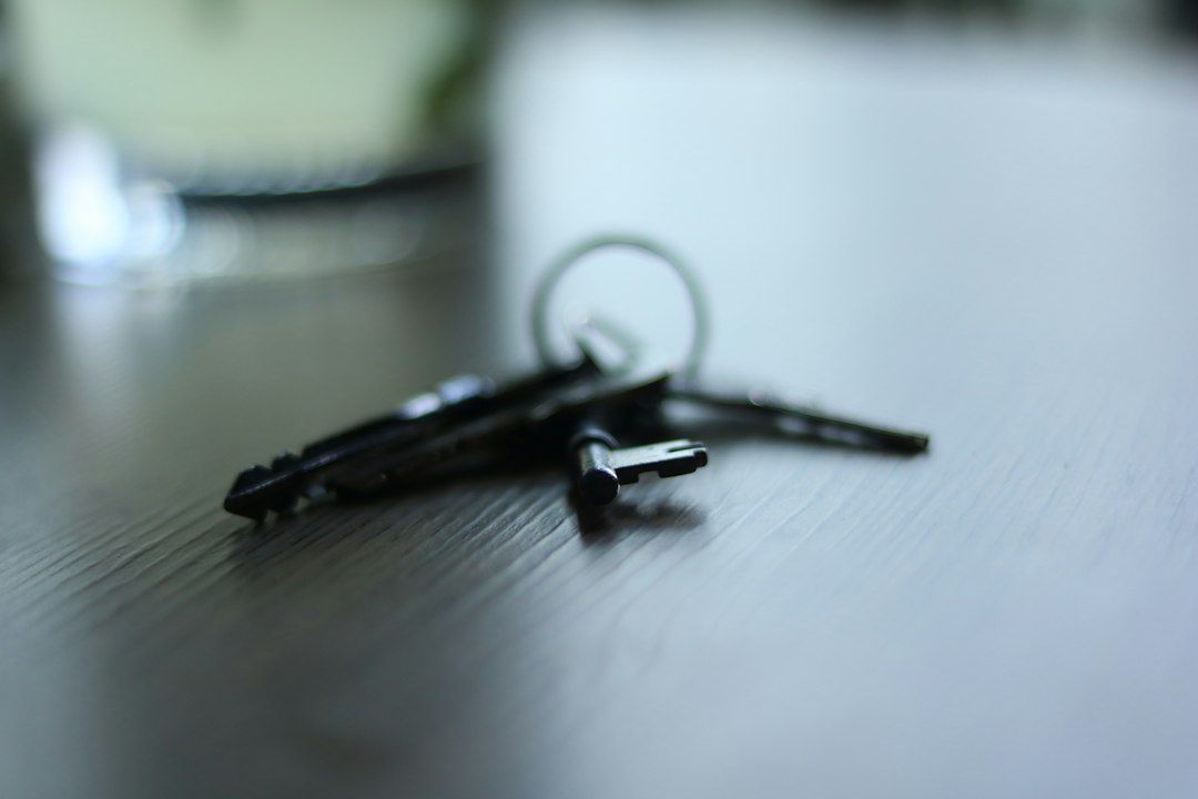 House keys and property deed on a table representing unfunded trust assets